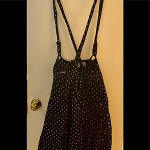 1X skull print black corduroy skirt with suspenders from Unique Vintage.